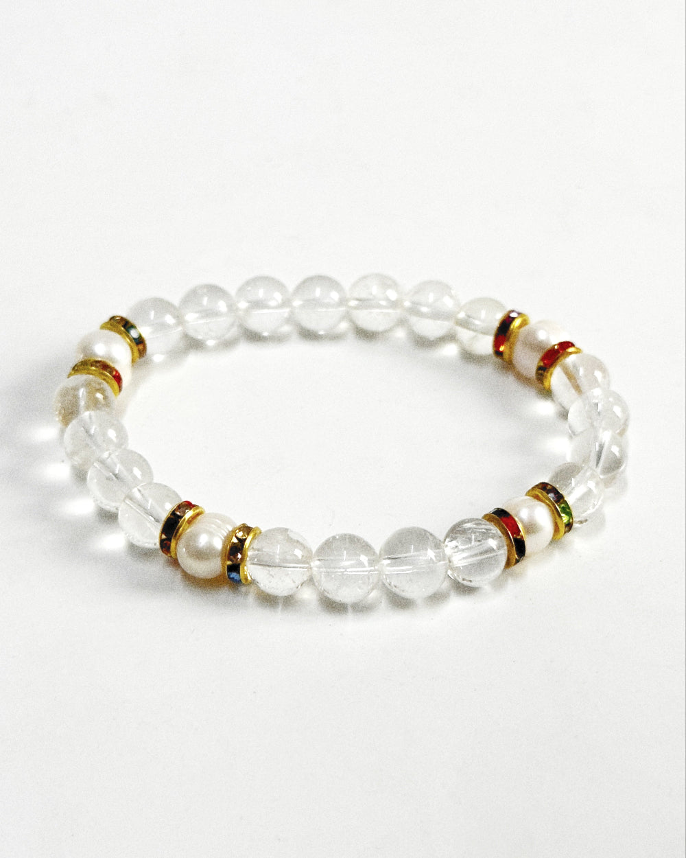 The STRATUS®️ Quartz &amp; Pearl Bracelet features natural freshwater pearls &amp; clear quartz strung with rhinestone-encrusted spacers in a yellow-gold finish.&nbsp;