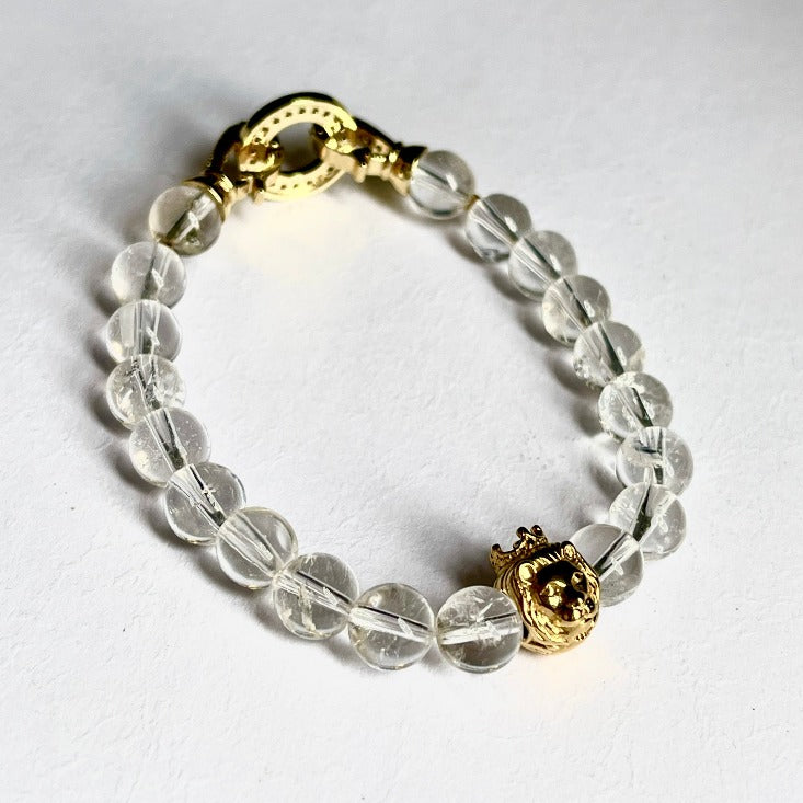A handcrafted bead bracelet by Cold Gold Philippines. Features our signature crowned lion bead with natural himalayan clear quartz stones.