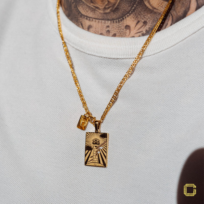 You never really understand the strength you possess until it is the only thing you have left.  The Tower medallion represents the vision and strength necessary to see through adversity and remain defiant against pressure and the overwhelming odds.  The piece features an eye attached to the turret of a tower, struck by lightning.  It rests on the ground marked with the words “STILL STANDING” along with the official Cold Gold logo."