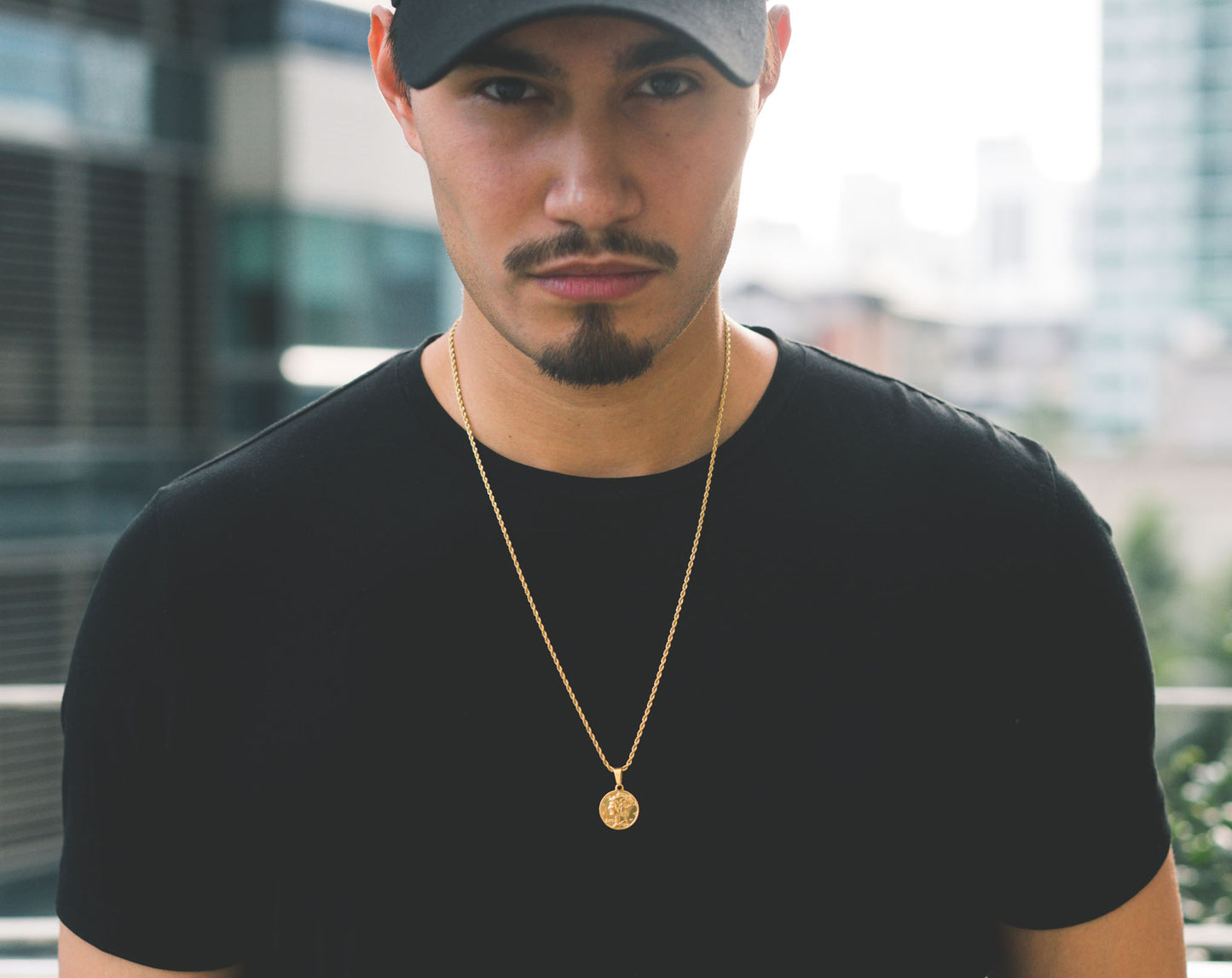 cold gold urban jewelry mini liberty piece with gold plated chain model daniel bradbury shot by rgvizuals